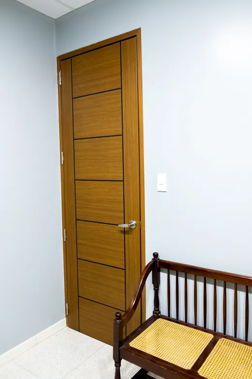Warm oak Polydoor hung in a styled bedroom